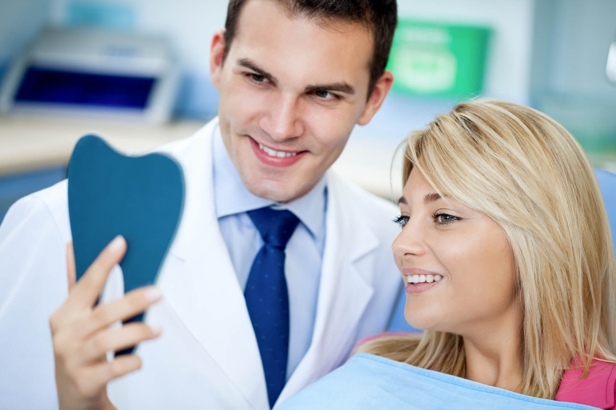 dentist showing patient options for dental implants in Port St. Lucie