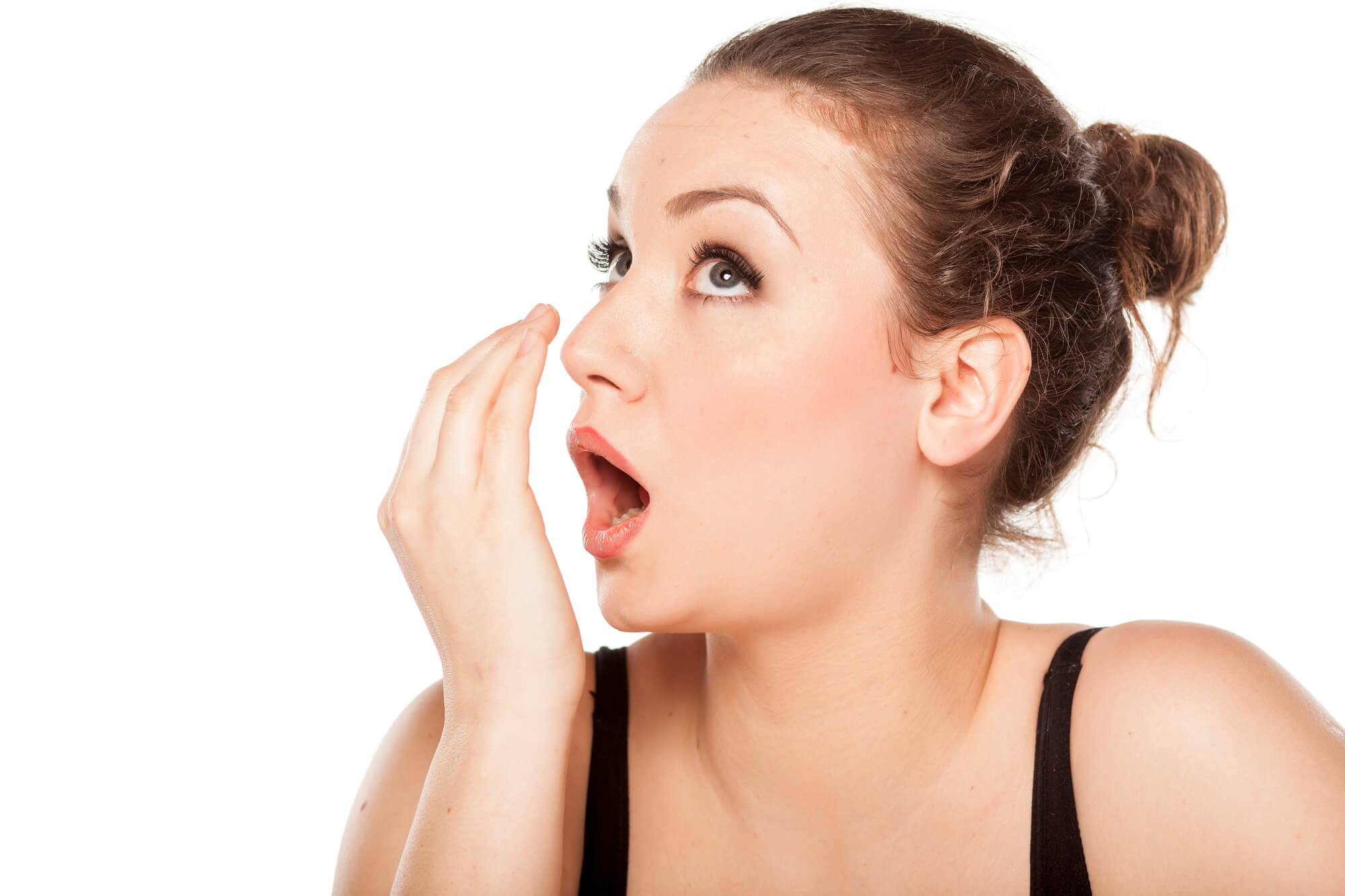 a woman with bad breath needing to see a Cosmetic Dentist in Fort Pierce