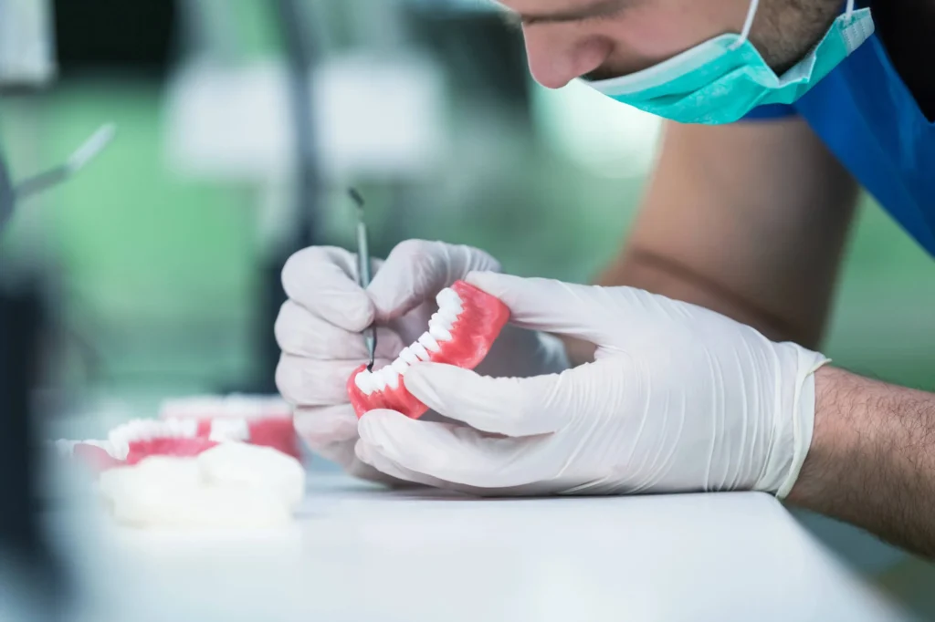 Dental technician working on dentures, dentures in Treasure Coast
