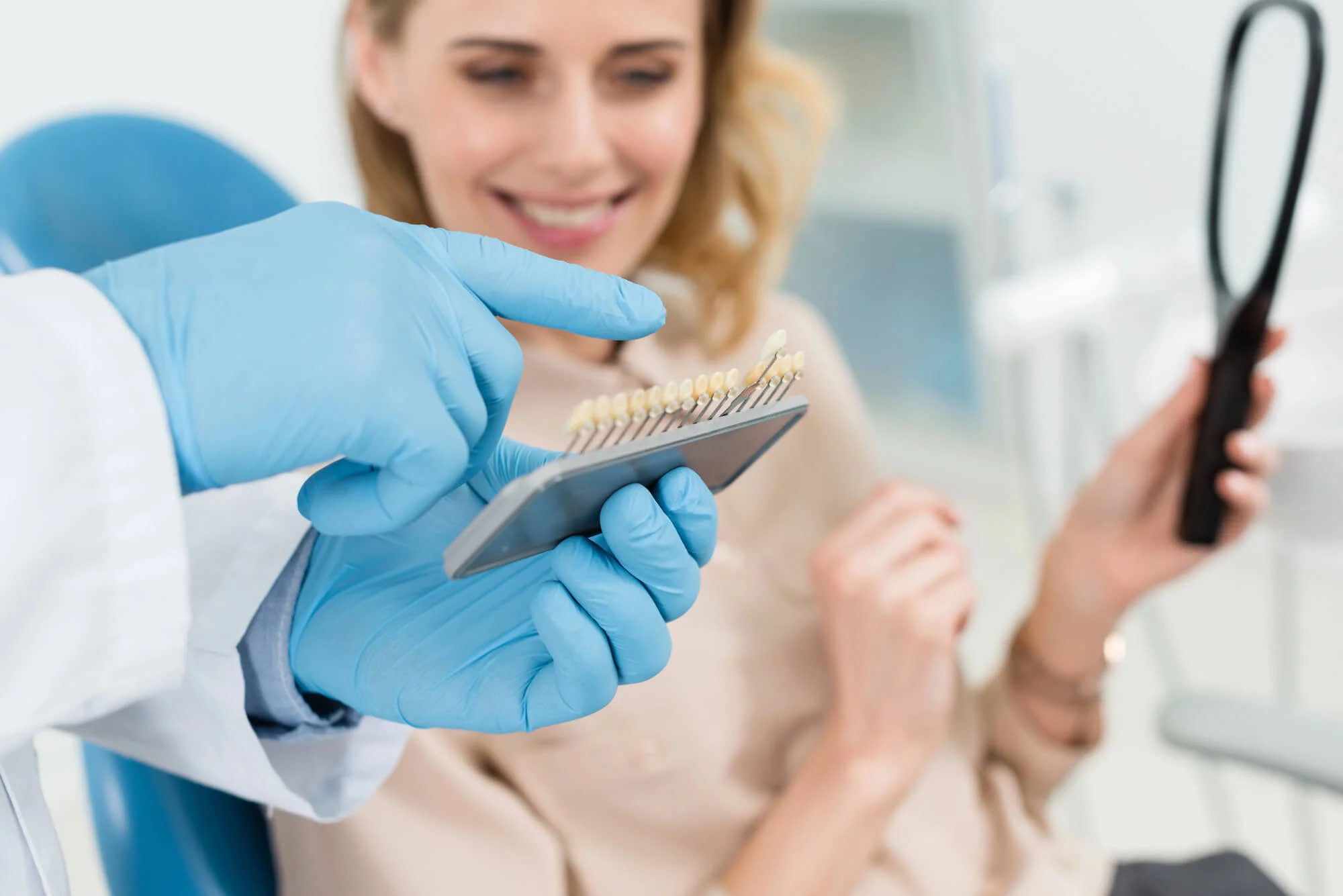 Dentist showing implant options to patient dental implants in Vero Beach