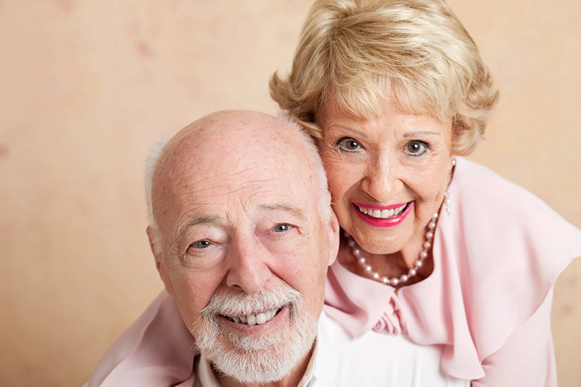 Couple smiling with thei new dentures by Fort Pierce Dentist