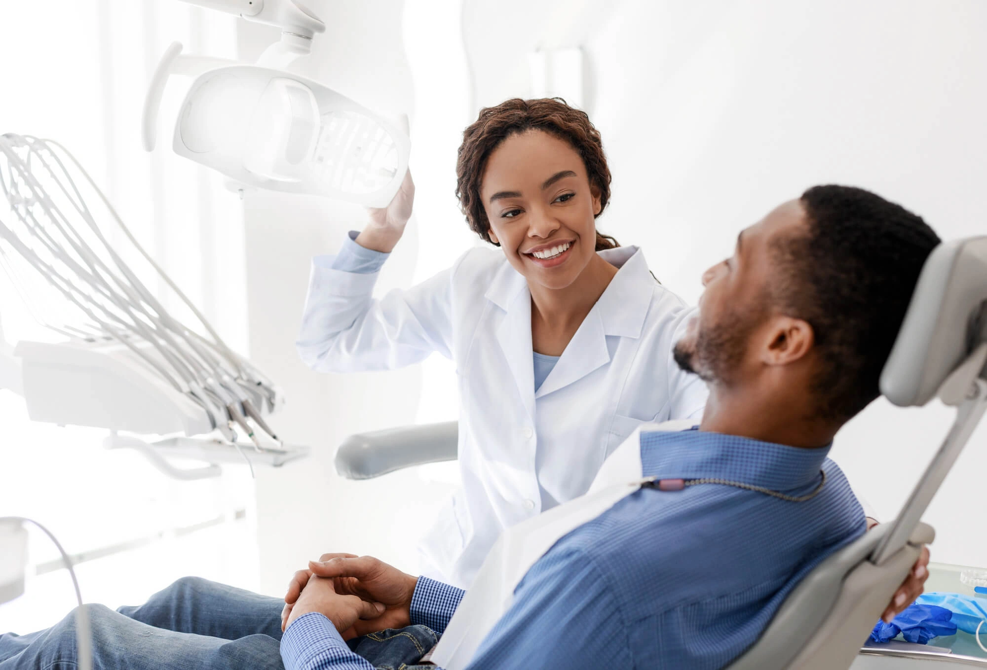 dentist Port St Lucie checking teeth of man