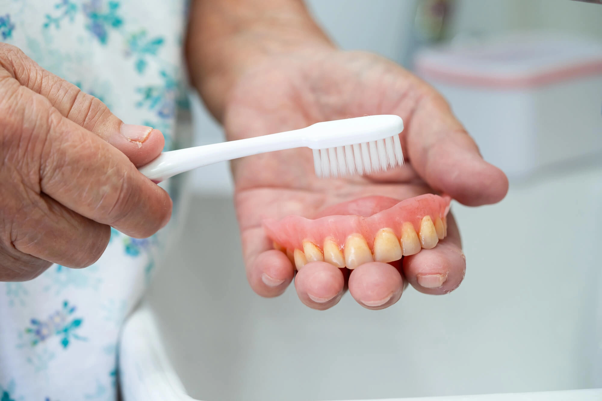 Brushing Treasure Coast Dentures