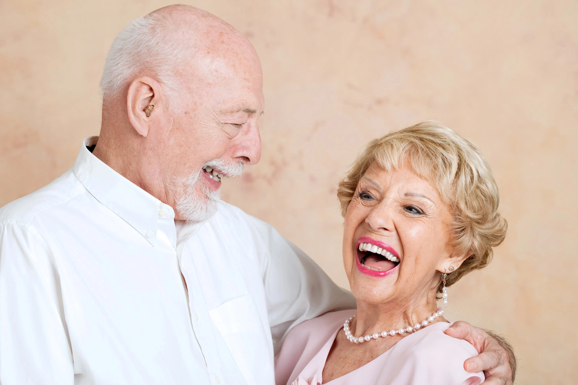 Couple smiling with Port St. Lucie Dentures